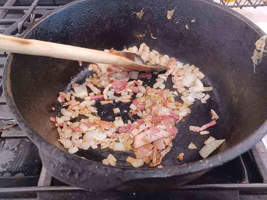 Saute Bacon and onions in Dutch Ove
